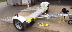 does towing a car add miles